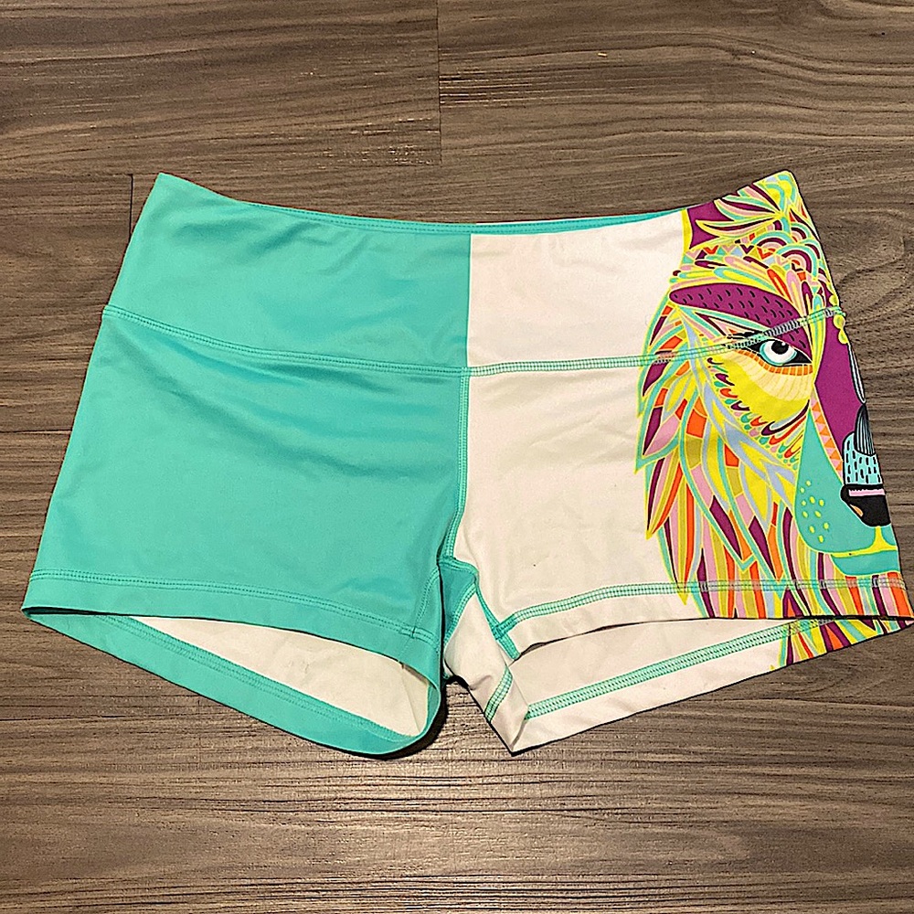 Trippy art design on comfy spandex booty shorts!
